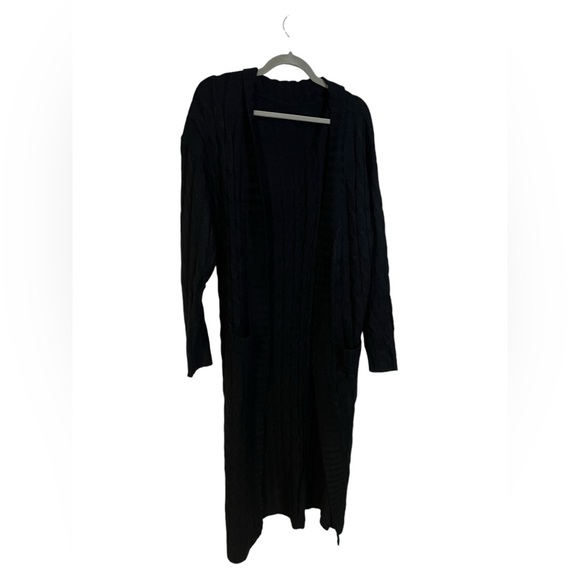 Sweaters - A new black knit sweater , open front with pockets in size